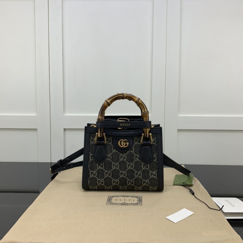 G*u*i top handle bags